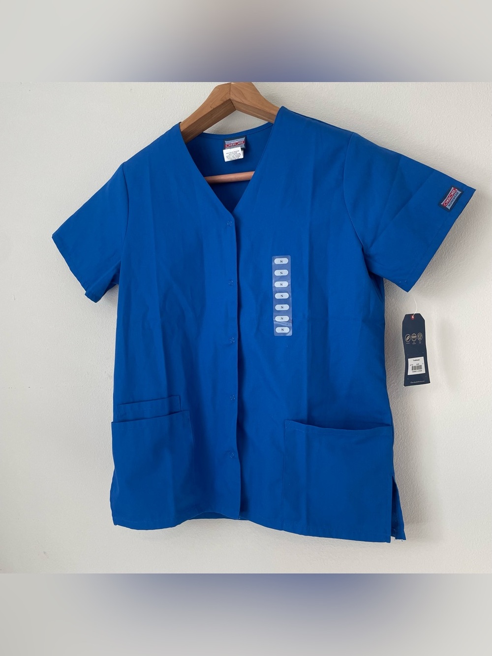 NEW Cherokee Women’s scrub top size S button down in royal blue